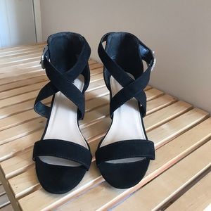Heeled sandals.